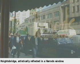 [Knightsbridge, artistically reflected in a Harrods window]