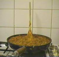 [Bolognaise sauce being cooked]
