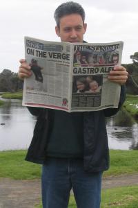 Daniel reading newspaper, Warrnambool