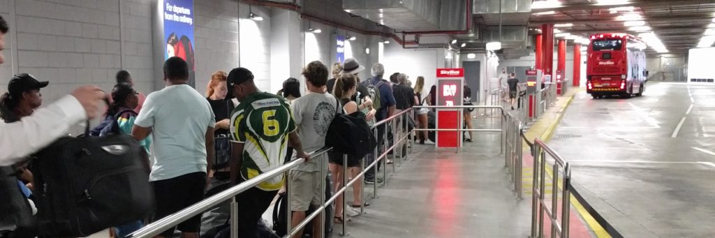 Queue for Skybus as bus departs