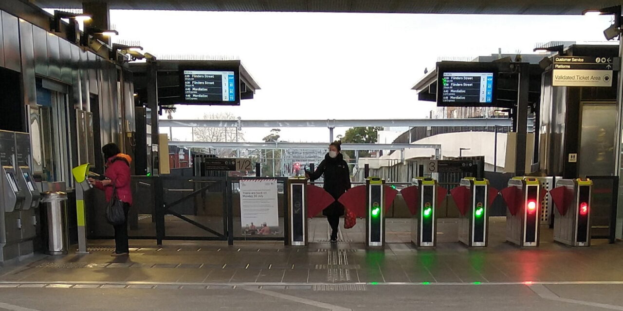 Bentleigh station, passenger wearing mask