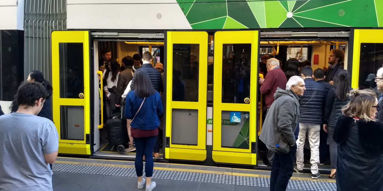 Crowded tram on Bourke Street