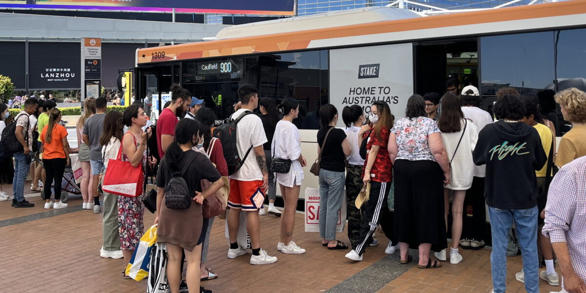 Crowd boarding a bus at Chadstone, Boxing Day 2022
