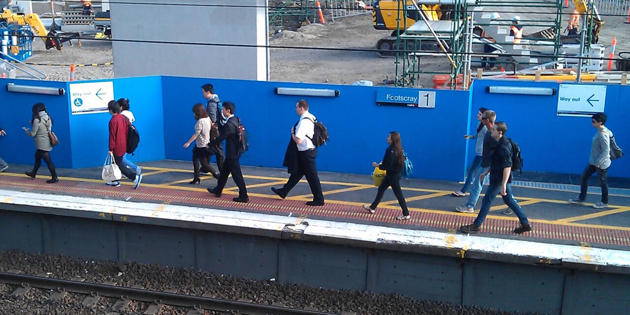 Passengers at Footscray station during construction