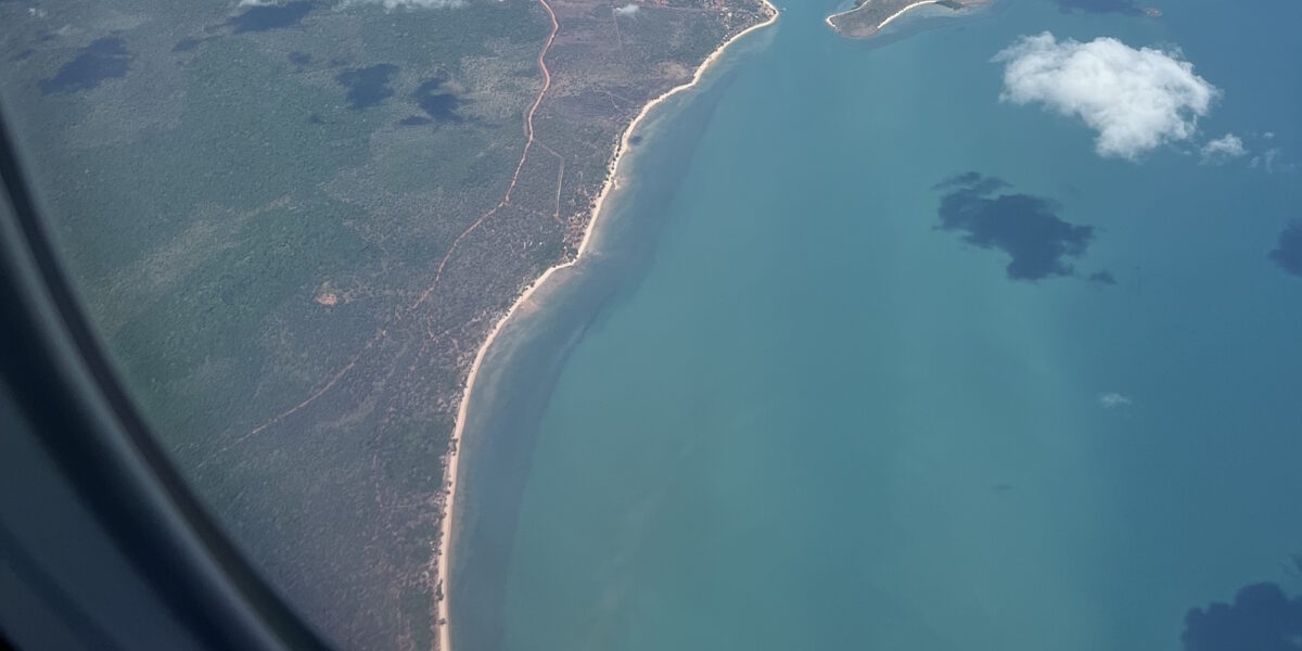 Sea and land viewed from a plane