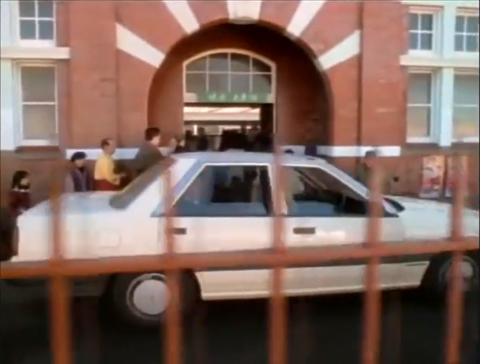 Caulfield station platform 1 entrance, seen in Mission Impossible. A vehicle drives up to the entrance.