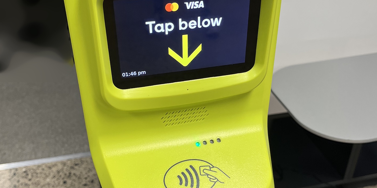 Myki reader showing Tap Below with Mastercard and Visa logos